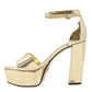 GUESS SANDALI CON TACCO PLATEAUX ORO