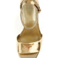 GUESS SANDALI CON TACCO PLATEAUX ORO
