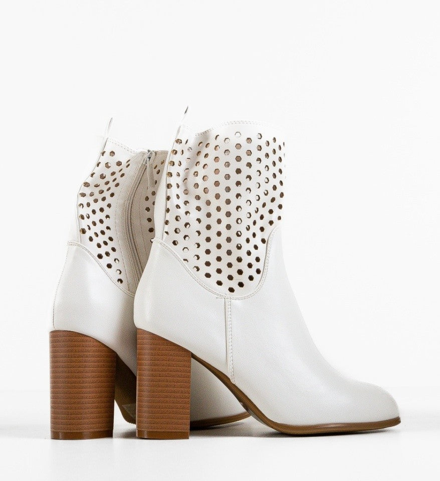 IMPRONTE SHOP - TRONCHETTO IN PELLE TRAFORATO DONNA