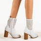IMPRONTE SHOP - TRONCHETTO IN PELLE TRAFORATO DONNA